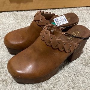 Brown clogs